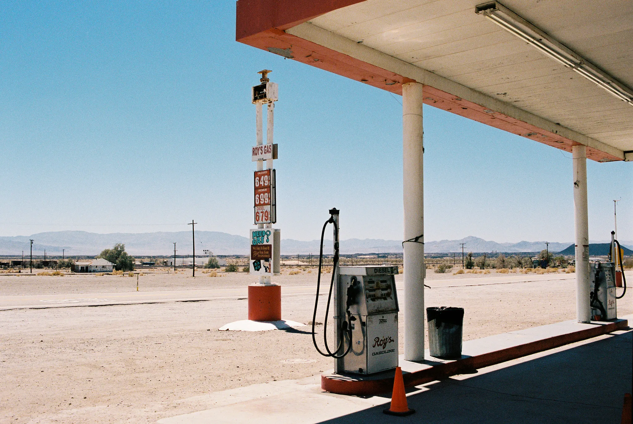 Roy's Gas station with vintage pumps and price sign in the Mojave Desert